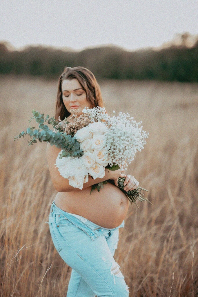 flower jeans maternity session